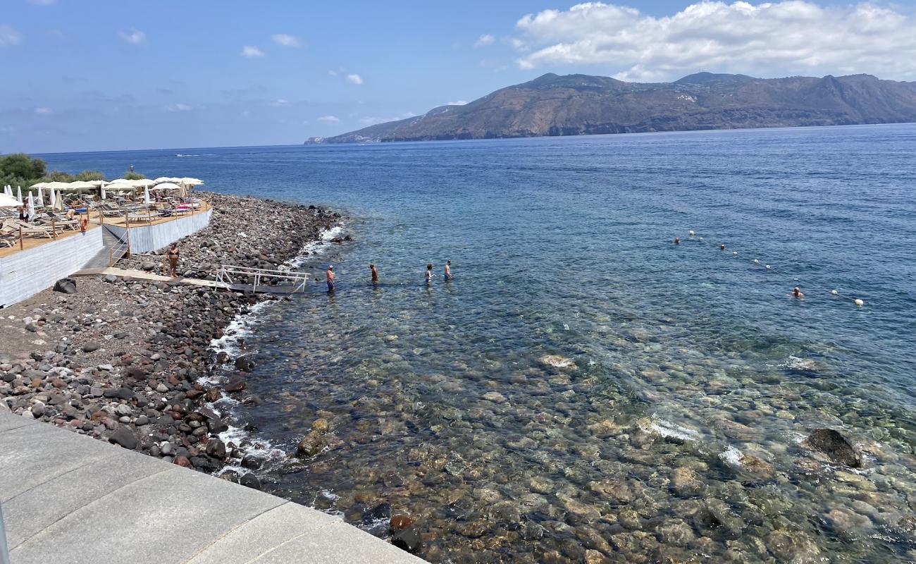 Punta Brigantino'in fotoğrafı taşlar yüzey ile