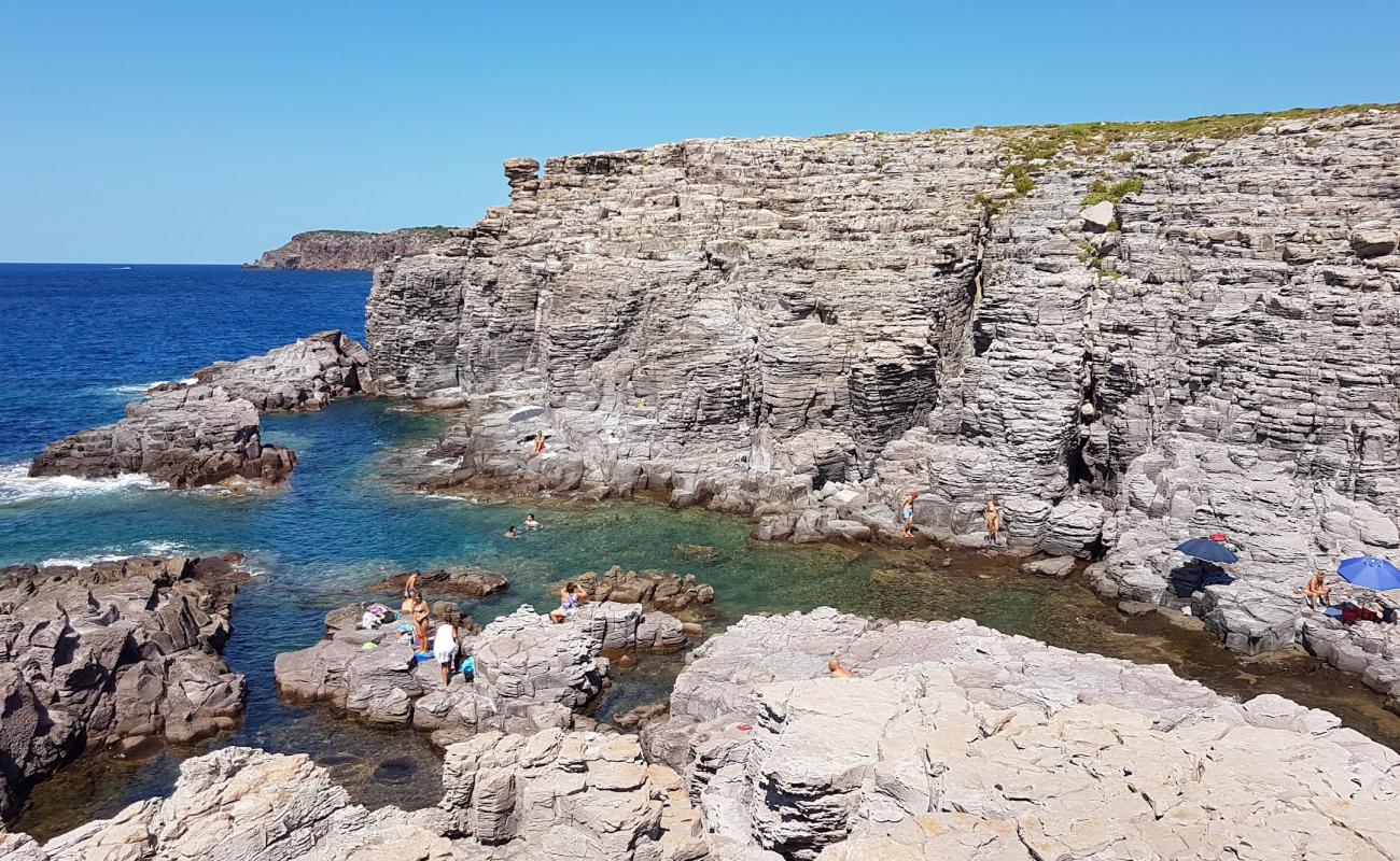 Conca Beach'in fotoğrafı rocky shore yüzey ile