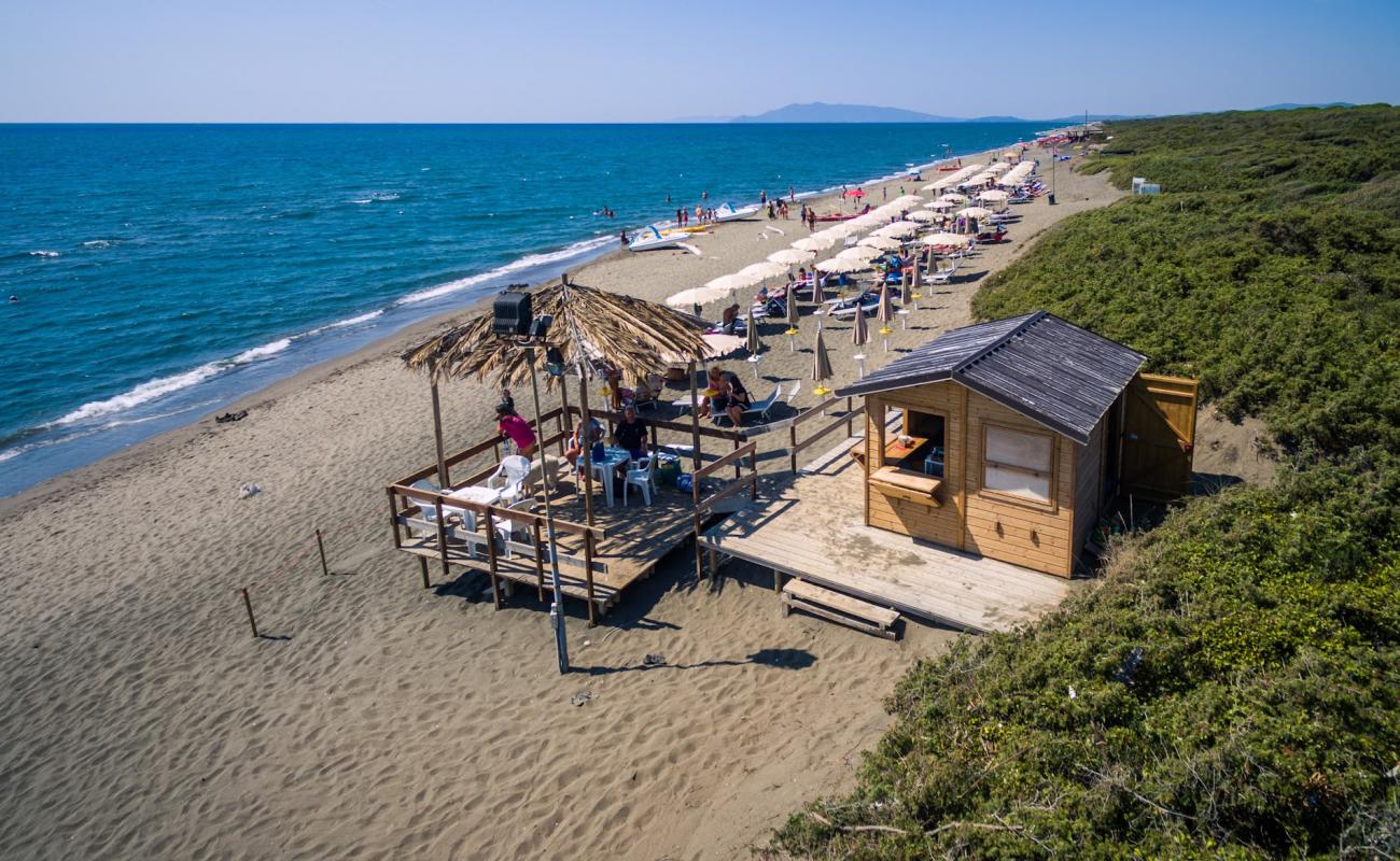 Casalaccio Beach'in fotoğrafı açık bej kum yüzey ile