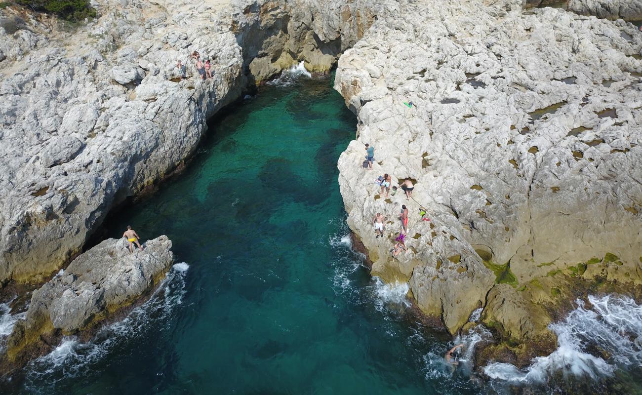 Batterie di Punta Rossa'in fotoğrafı taşlar yüzey ile