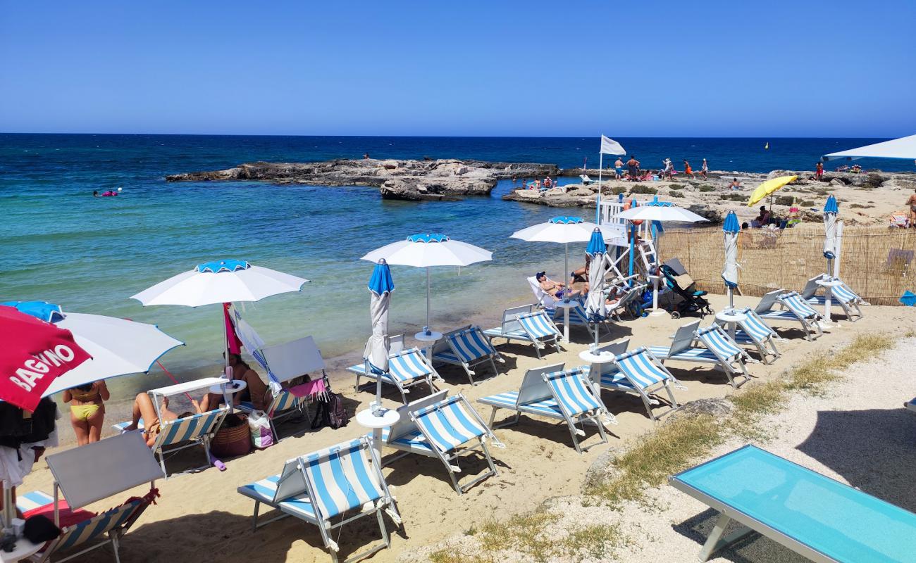 Lido Cala Pescatore'in fotoğrafı açık bej kum yüzey ile