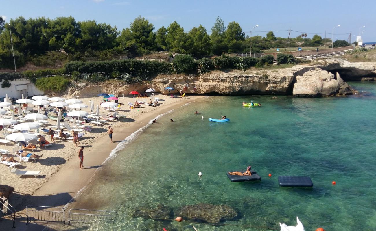 Porto Giardino Beach'in fotoğrafı parlak kum yüzey ile