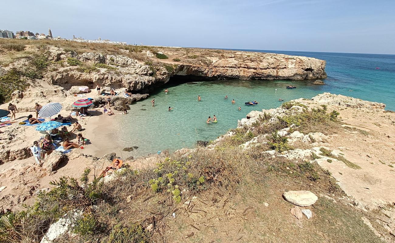 Spiaggia di Porto Verde'in fotoğrafı parlak kum yüzey ile