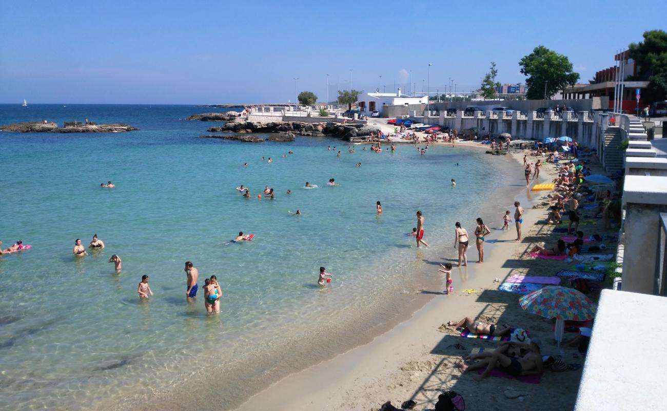 Spiaggia Cala Porta Vecchia'in fotoğrafı parlak kum yüzey ile