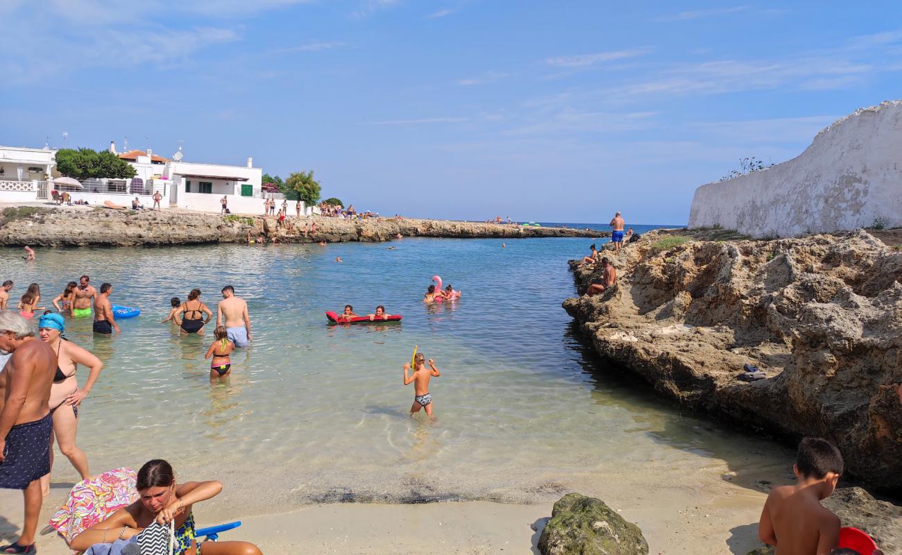 Spiaggia Porto Contessa'in fotoğrafı parlak kum yüzey ile