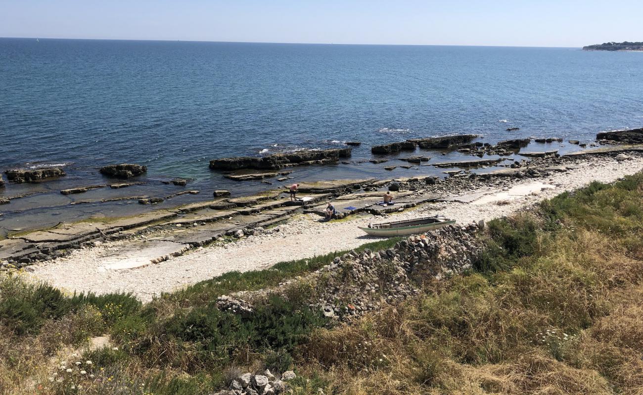 Le Conche Naturist Beach'in fotoğrafı kayalık arazi yüzey ile