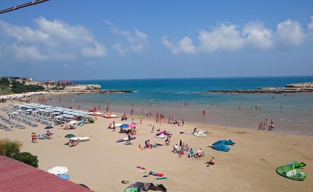 La Chianca Beach'in fotoğrafı açık bej kum yüzey ile