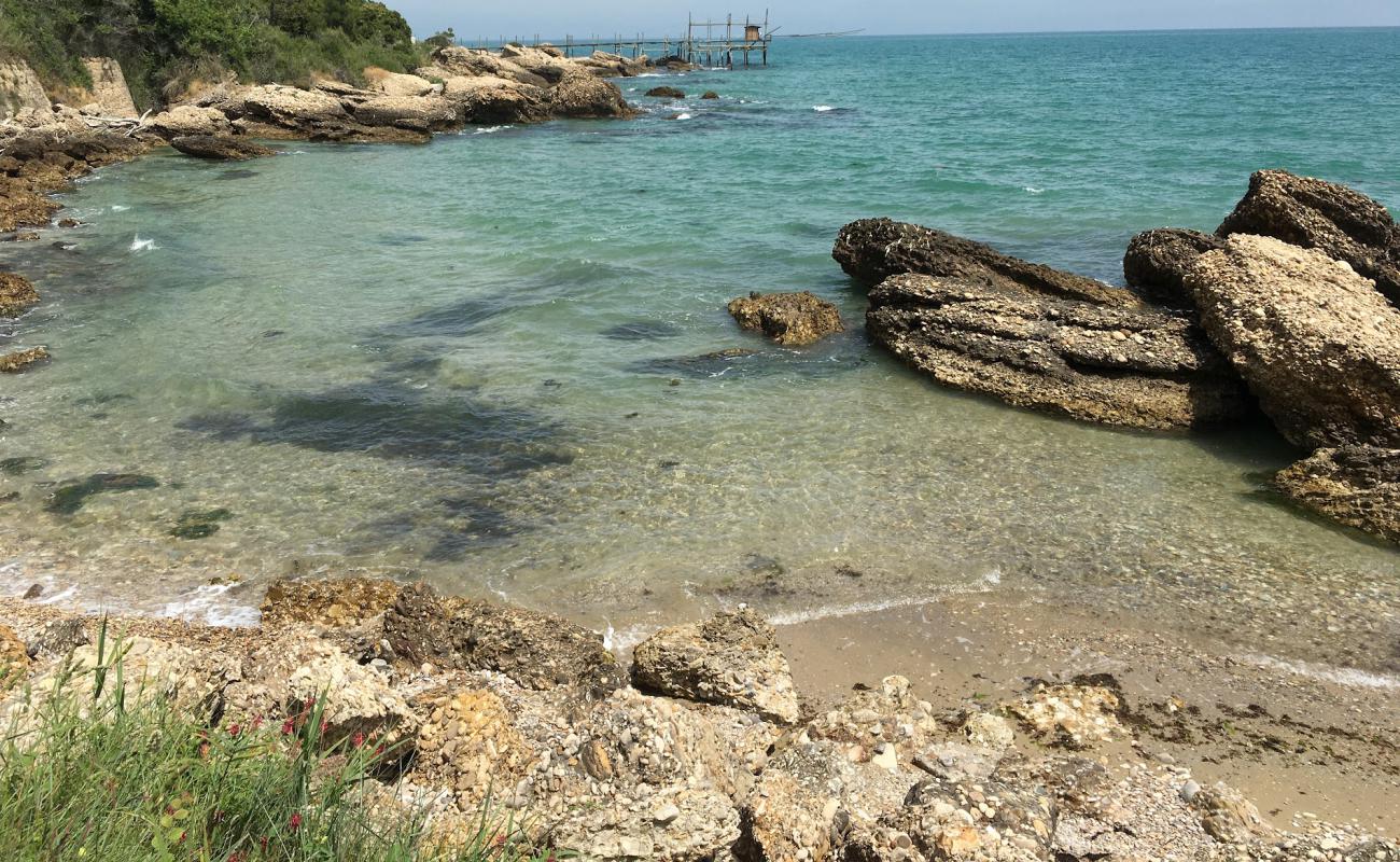 Torricella Beach'in fotoğrafı bej çakıl yüzey ile