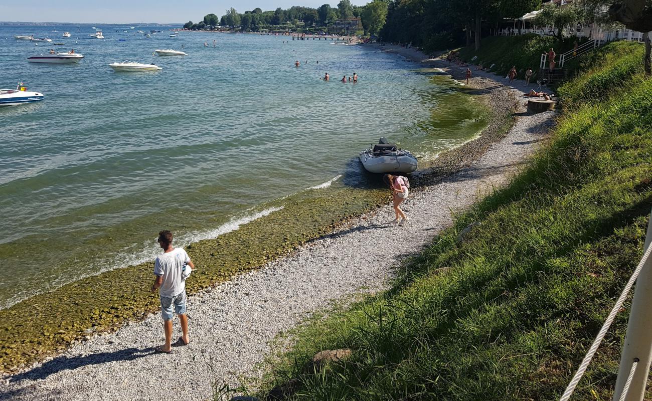 Baia Bianca Beach'in fotoğrafı gri çakıl taşı yüzey ile