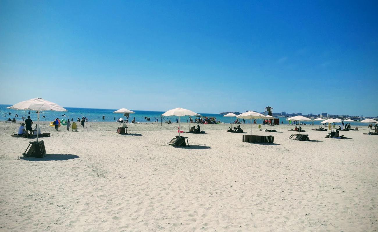 Dostar Beach'in fotoğrafı parlak kum yüzey ile