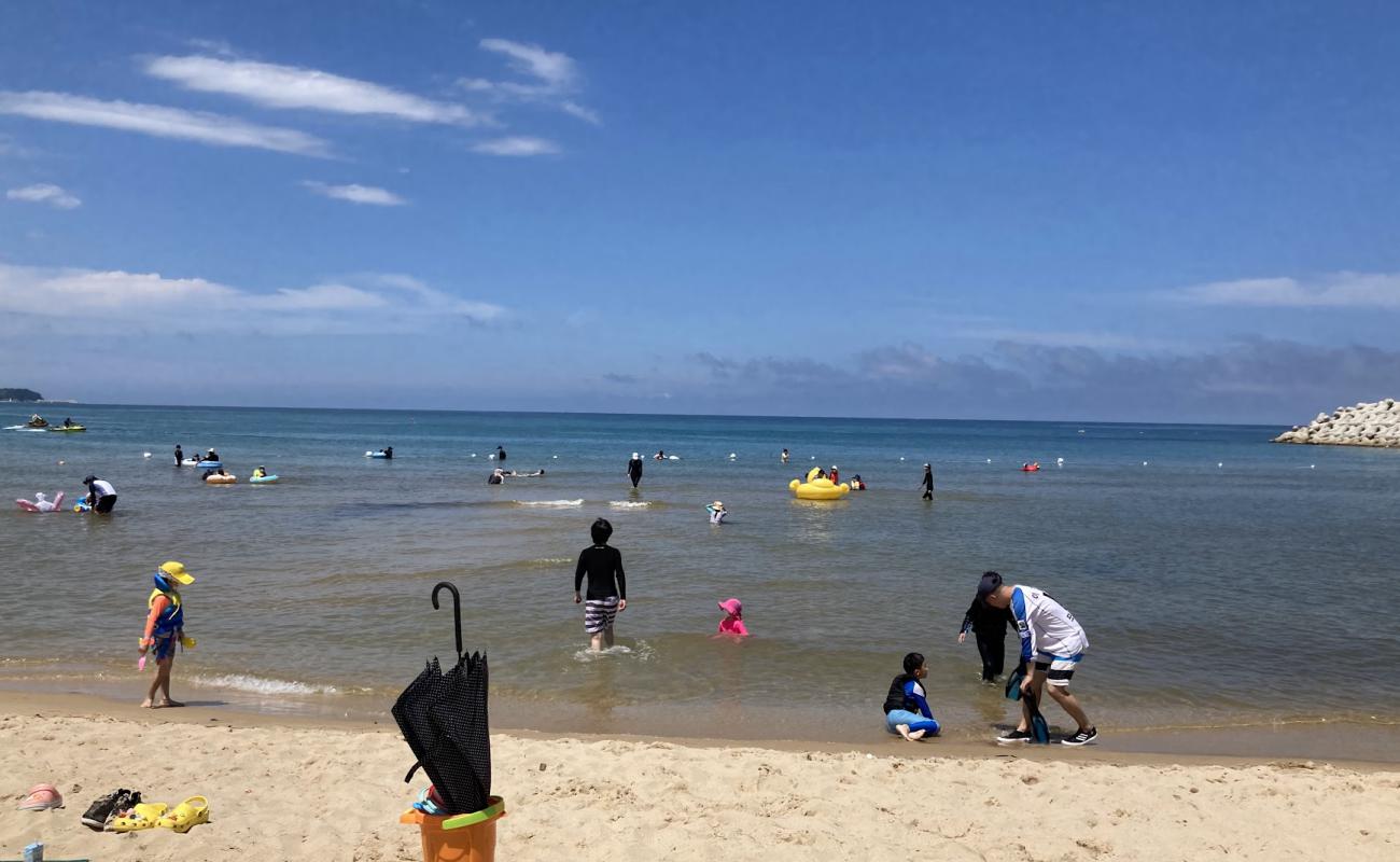 Namae Beach'in fotoğrafı açık bej kum yüzey ile