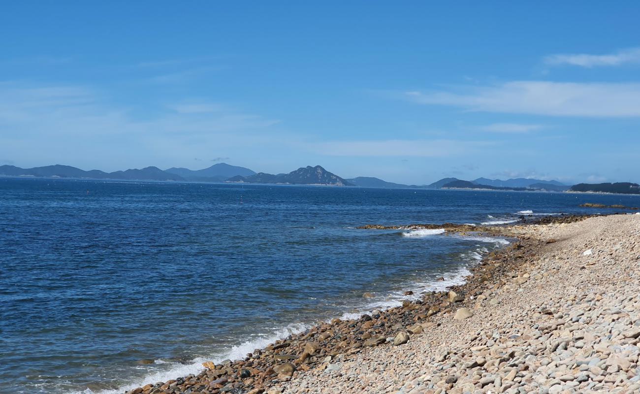 Ocheon Beach'in fotoğrafı gri çakıl taşı yüzey ile