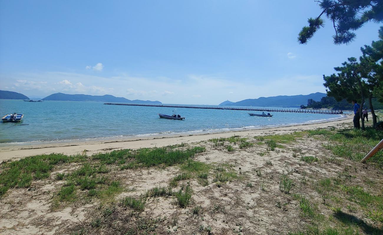 Sagumi Beach'in fotoğrafı açık bej kum yüzey ile