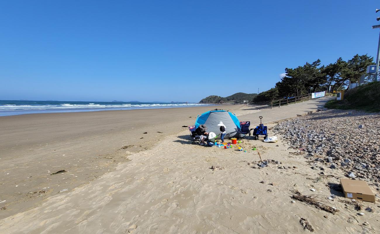 Baggae Beach'in fotoğrafı açık bej kum yüzey ile
