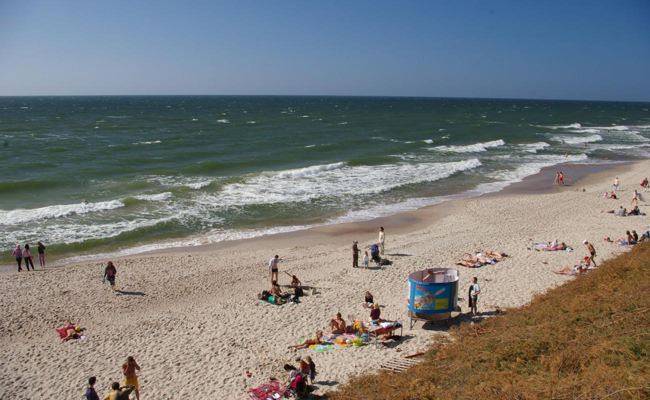 Preilos beach'in fotoğrafı açık bej kum yüzey ile