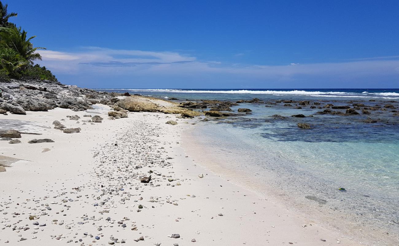 Neregando Beach'in fotoğrafı bej kum ve çakıl yüzey ile