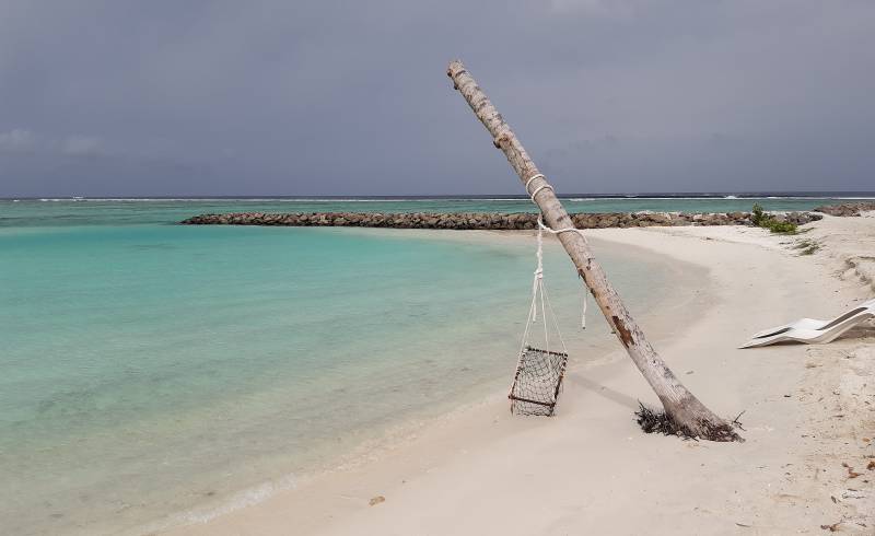 Huraa beach'in fotoğrafı parlak kum yüzey ile