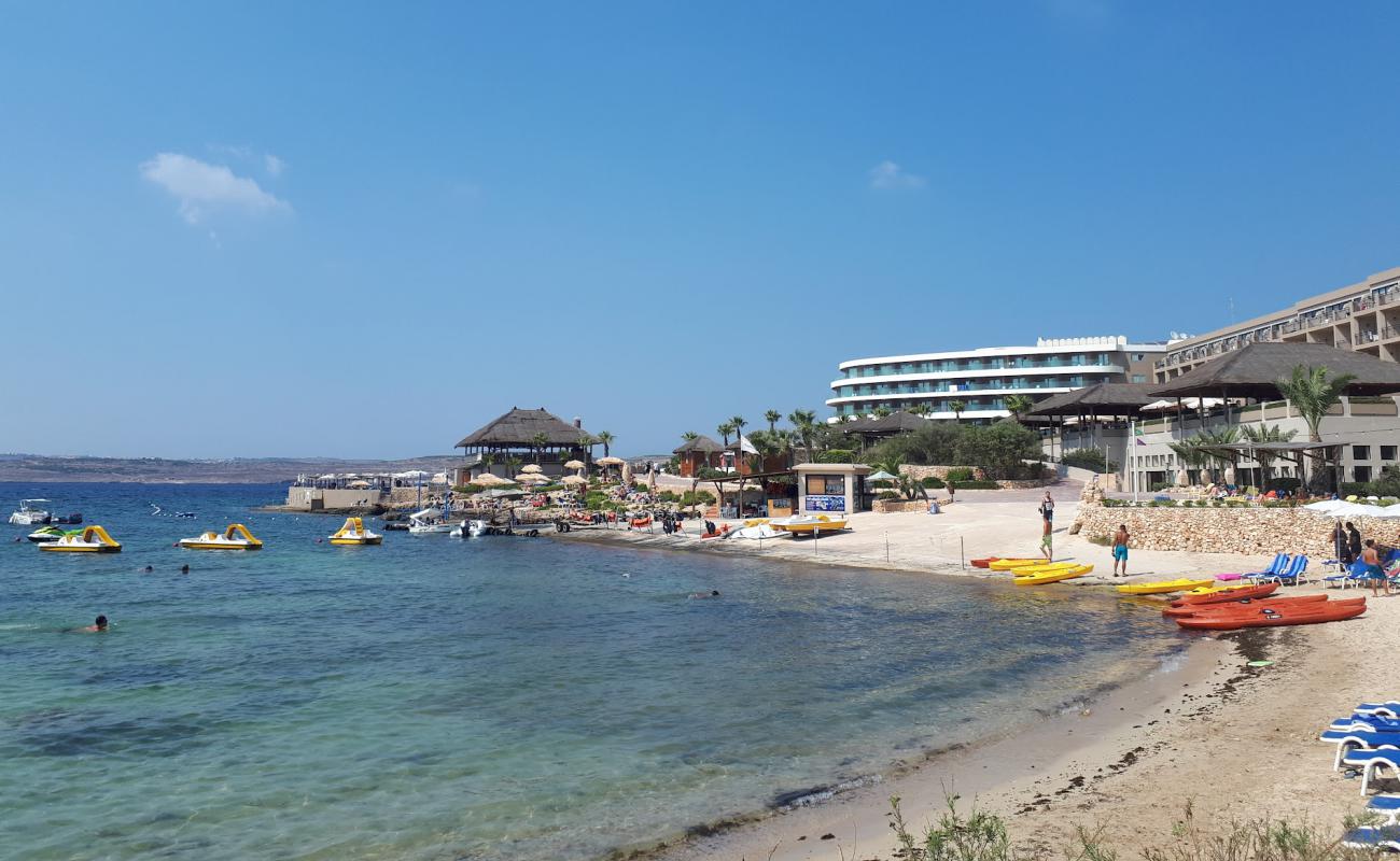 Ramla Bay'in fotoğrafı açık bej kum yüzey ile