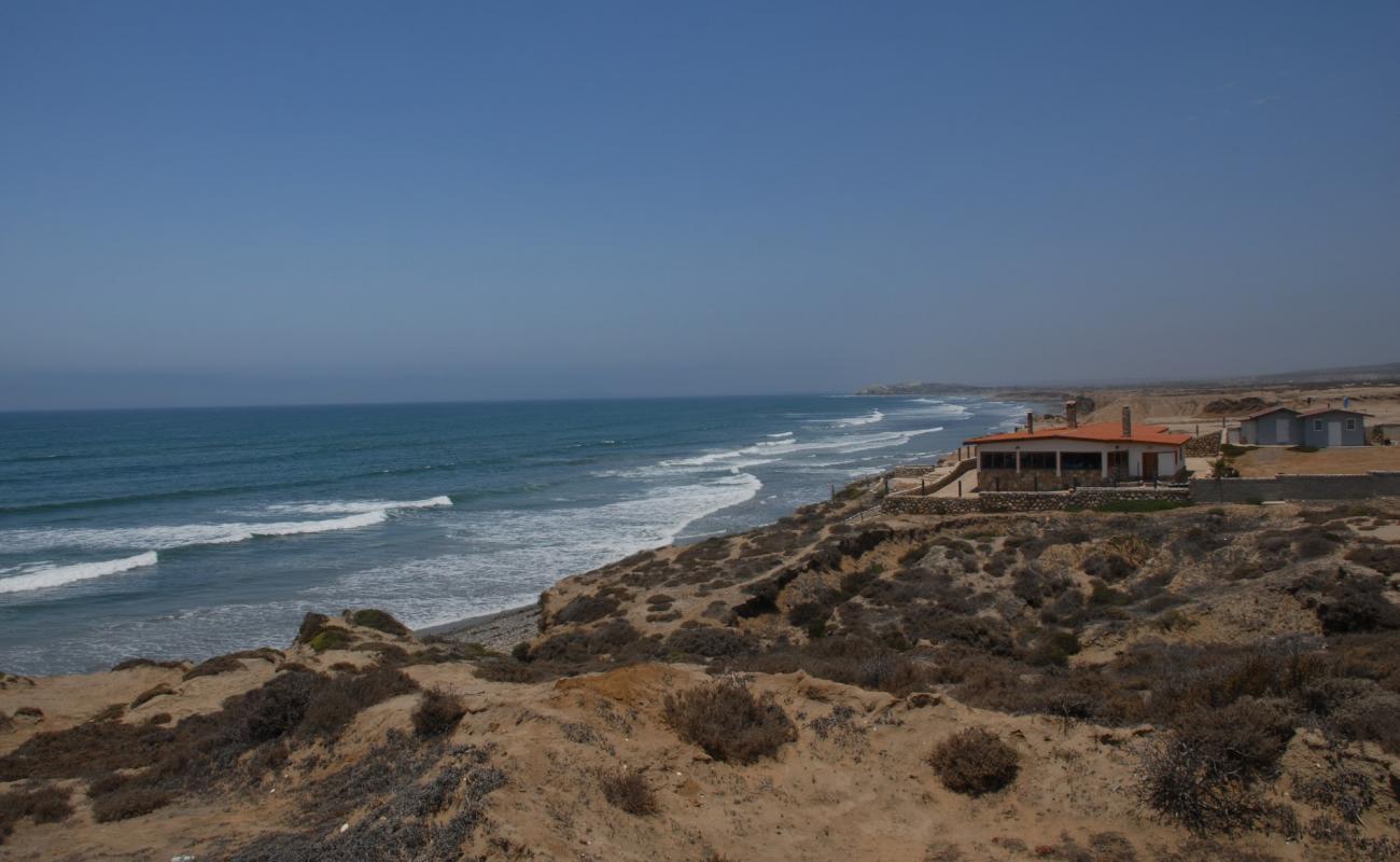 Playa Valle Tranquilo'in fotoğrafı siyah kum ve çakıllar yüzey ile