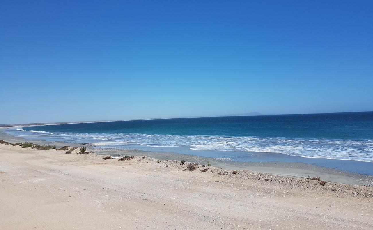 Bahia Asuncion Beach'in fotoğrafı kahverengi kum yüzey ile