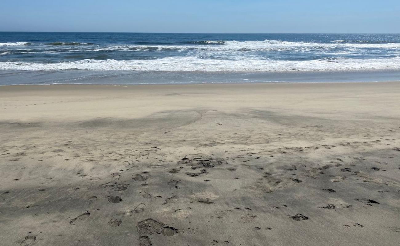 El Cunano beach'in fotoğrafı i̇nce kahverengi kum yüzey ile