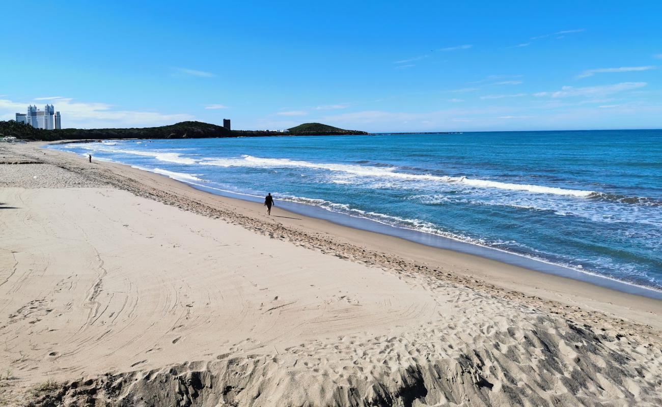 La Escopama beach'in fotoğrafı parlak kum yüzey ile