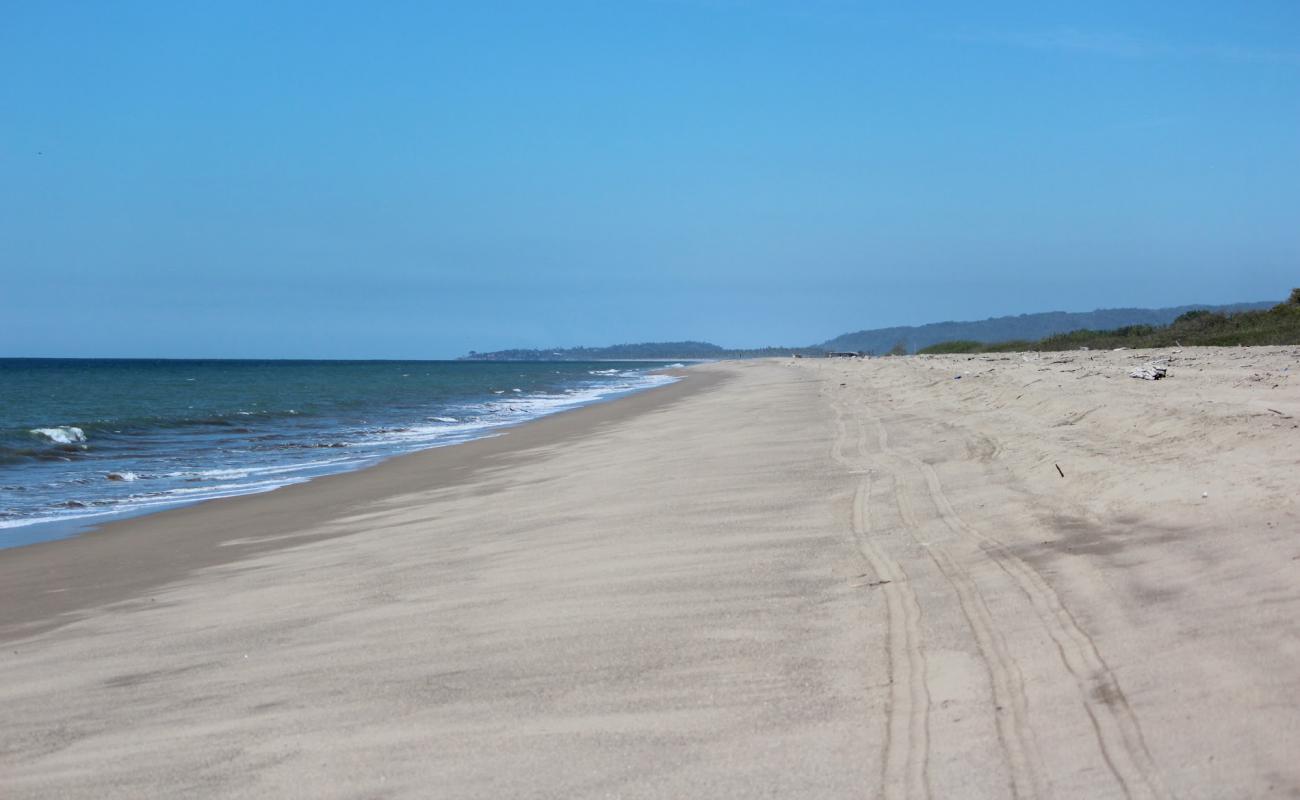 Chila beach II'in fotoğrafı parlak kum yüzey ile