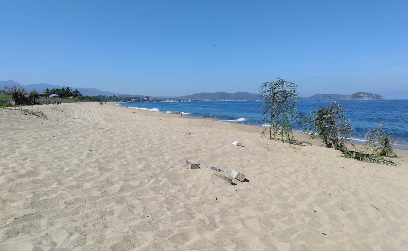 El Naranjo beach'in fotoğrafı parlak ince kum yüzey ile