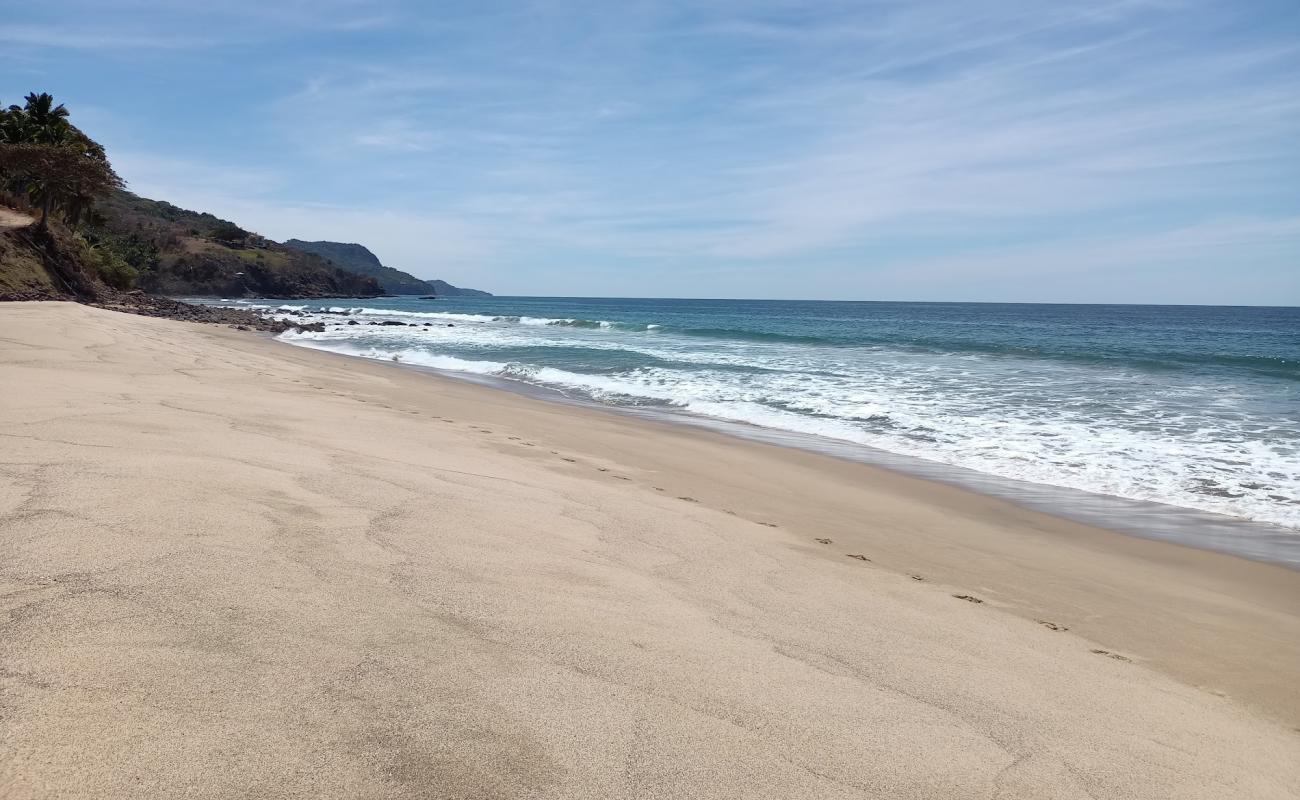 Punta Raza beach'in fotoğrafı parlak ince kum yüzey ile