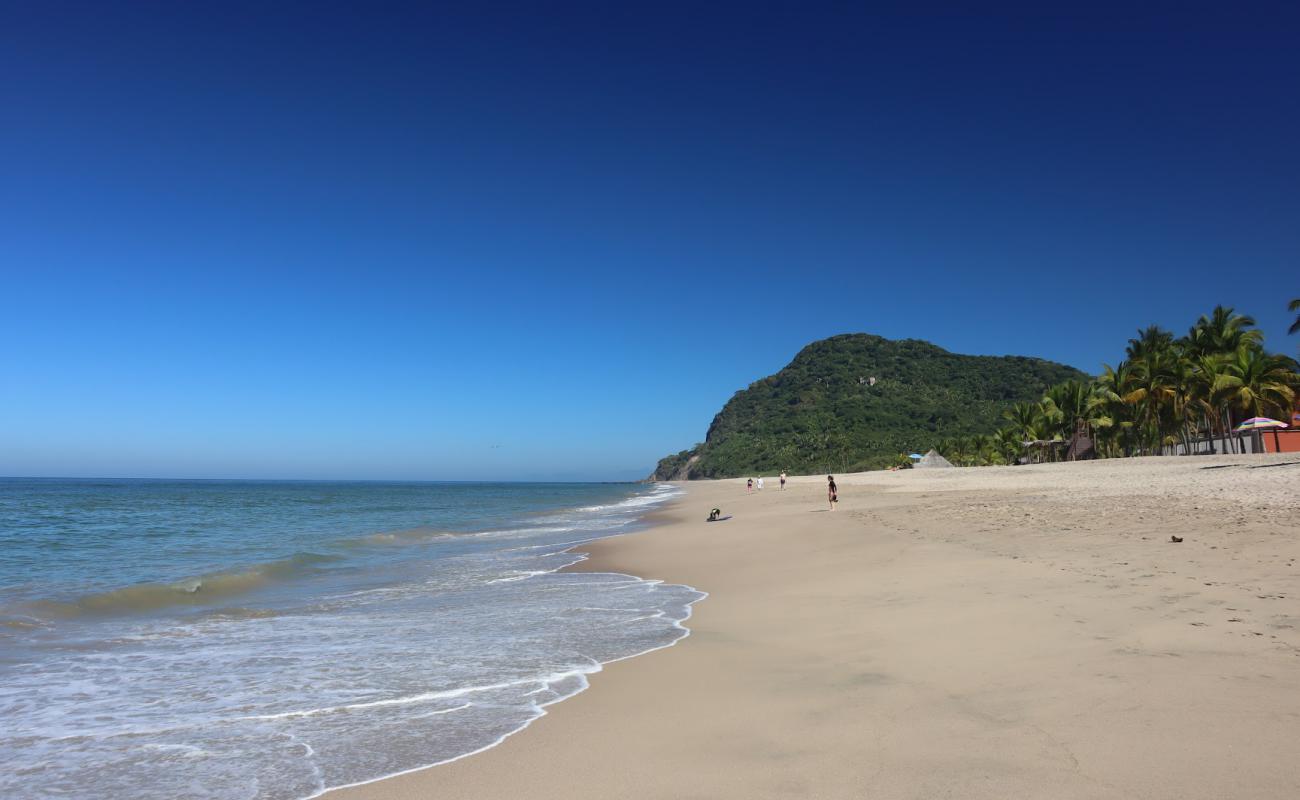Lo de Marcos beach'in fotoğrafı açık bej kum yüzey ile