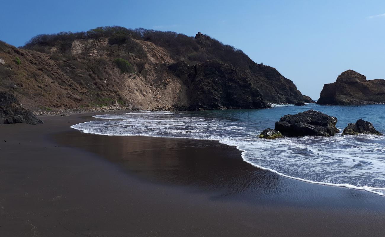 Playa del Viejo'in fotoğrafı kahverengi kum yüzey ile