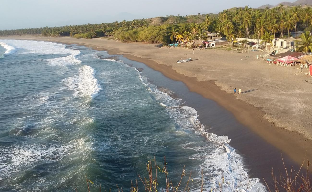 Playa de San Telmo'in fotoğrafı kahverengi kum yüzey ile