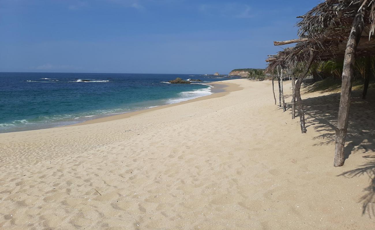 Playa La Palma Sola'in fotoğrafı parlak kum yüzey ile