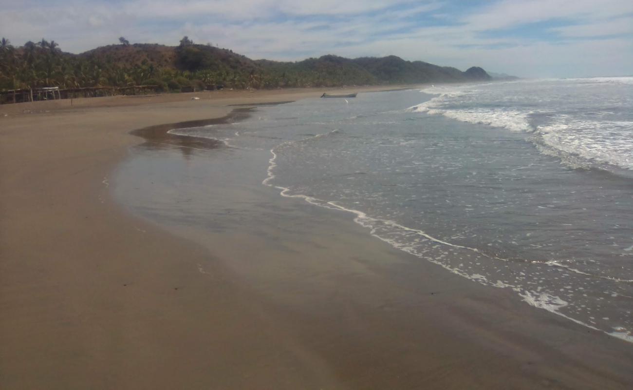 Playa La Manzanilla II'in fotoğrafı kahverengi kum yüzey ile
