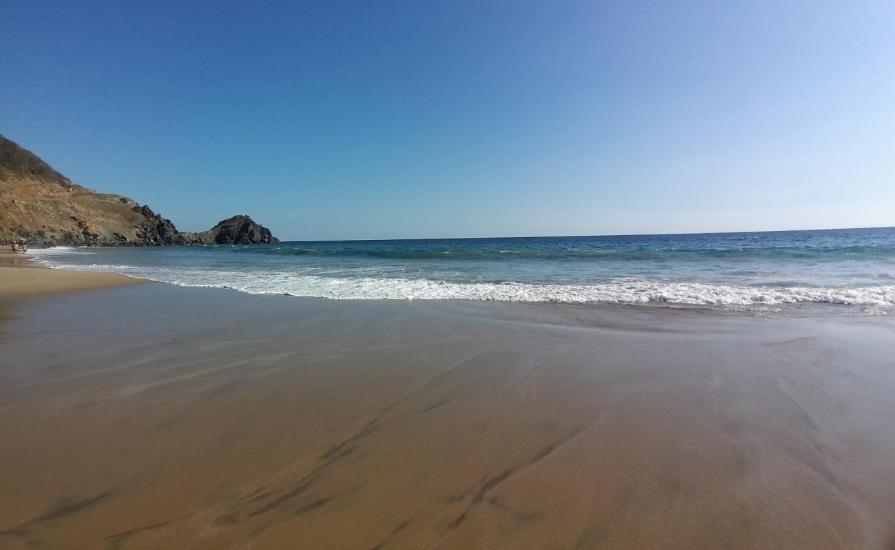 Playa Puerto Vicente'in fotoğrafı parlak ince kum yüzey ile