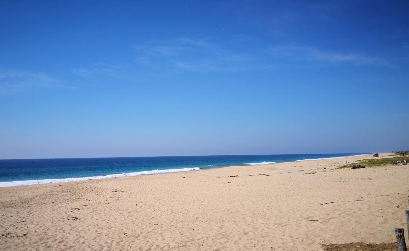 Playa Mitla'in fotoğrafı açık bej kum yüzey ile
