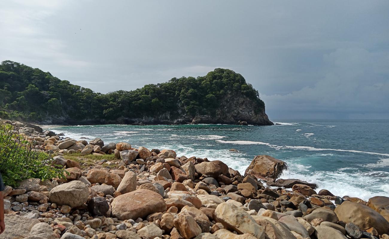 Playa Las Monjitas'in fotoğrafı parlak kum ve kayalar yüzey ile