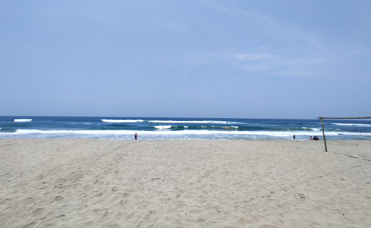 Playa El Dorado'in fotoğrafı parlak kum yüzey ile