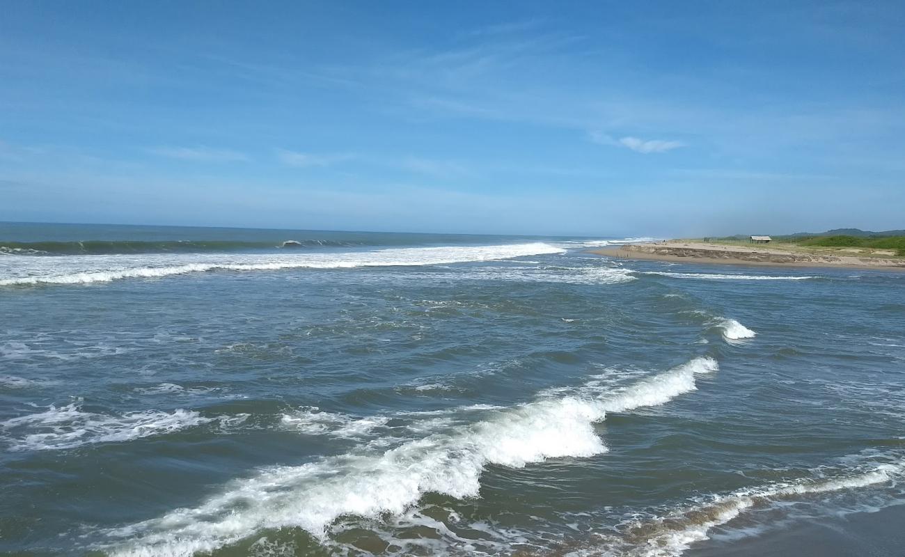 Playa la Tuza de Monroy'in fotoğrafı parlak kum yüzey ile