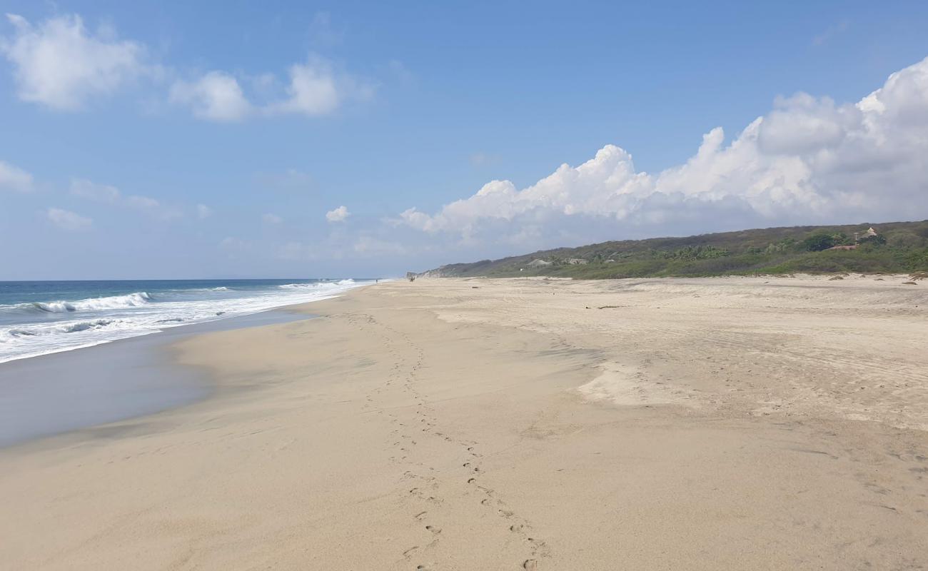 Punta Zicatela II'in fotoğrafı parlak ince kum yüzey ile