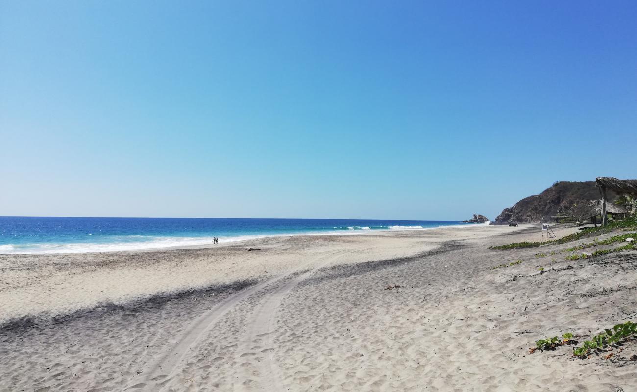 Playa Mermejita'in fotoğrafı gri ince kum yüzey ile