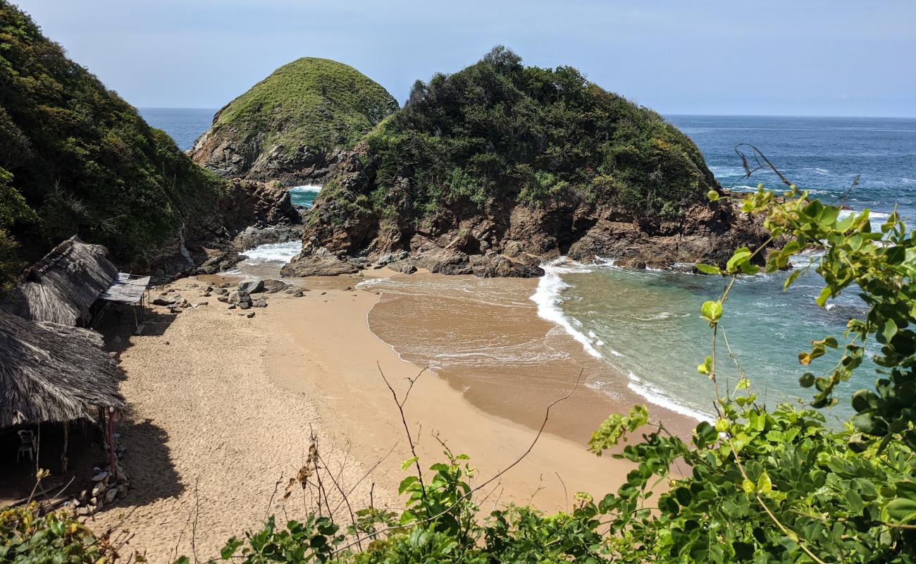 Playa del Amor'in fotoğrafı i̇nce bej kum yüzey ile