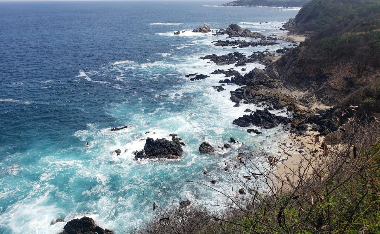 Arroyito beach'in fotoğrafı taşlı kum yüzey ile