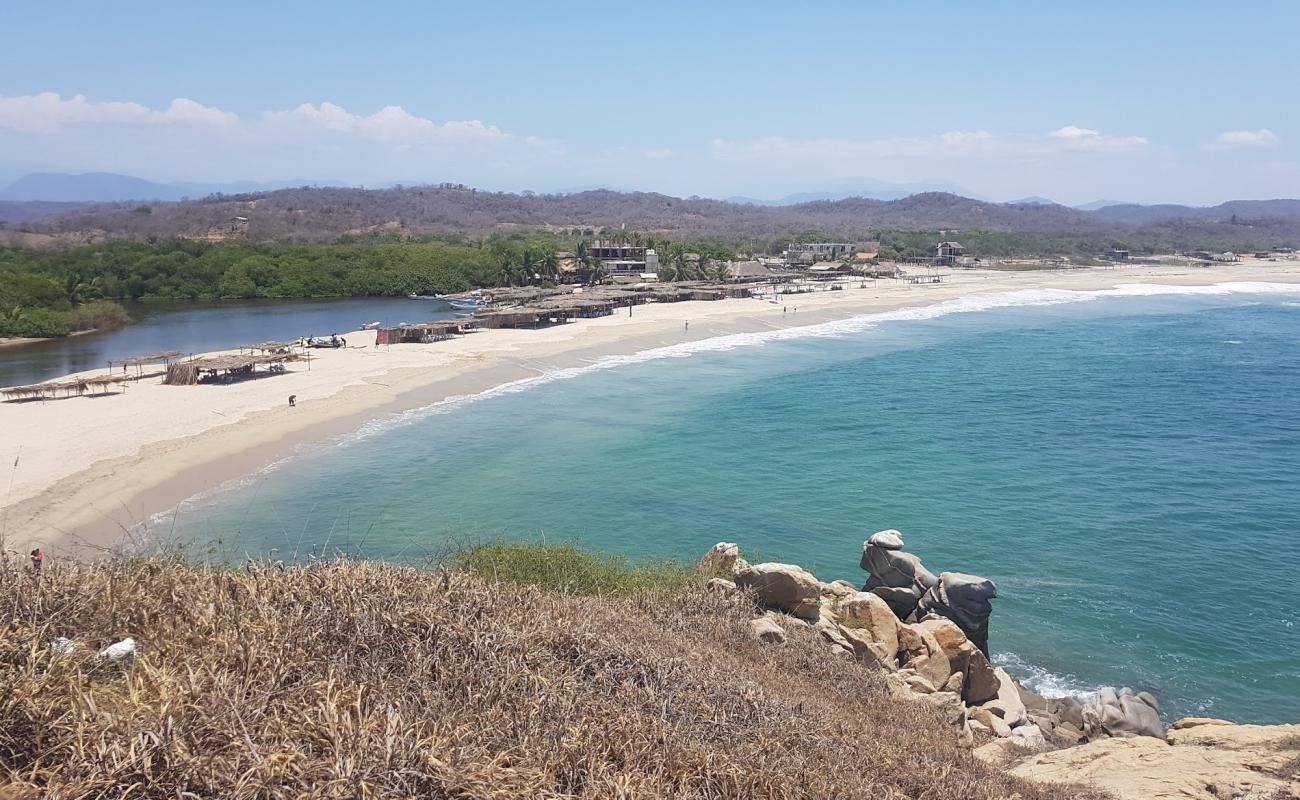 Coyula beach'in fotoğrafı parlak ince kum yüzey ile