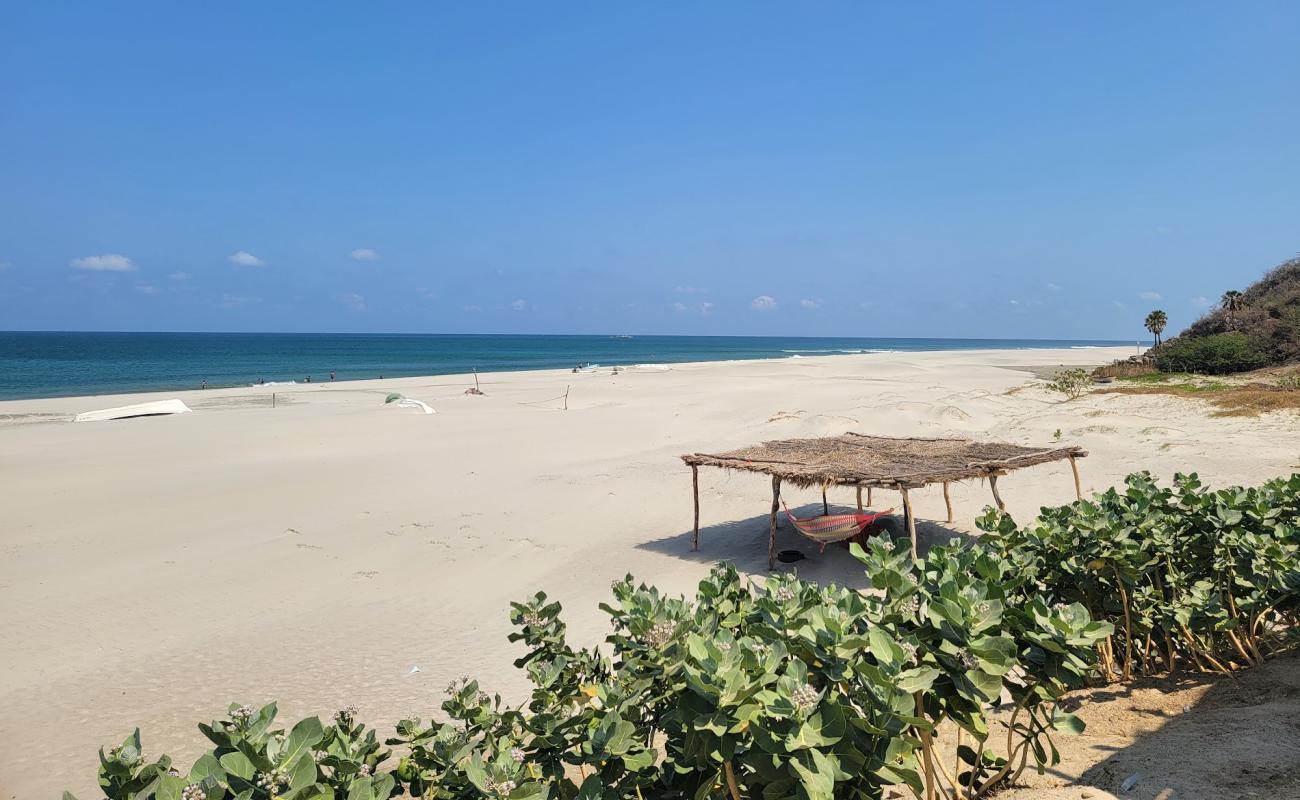 Playa Chipehua'in fotoğrafı parlak kum yüzey ile