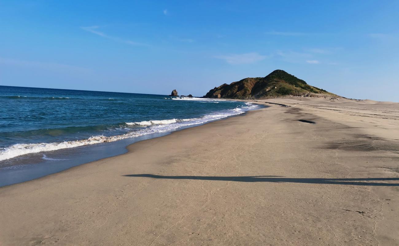 Guelaguechi beach'in fotoğrafı gri kum yüzey ile