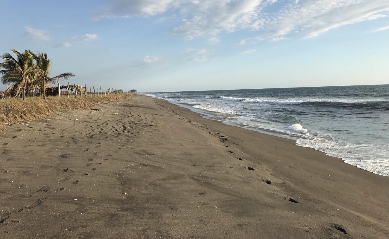 San Simon beach'in fotoğrafı gri kum yüzey ile