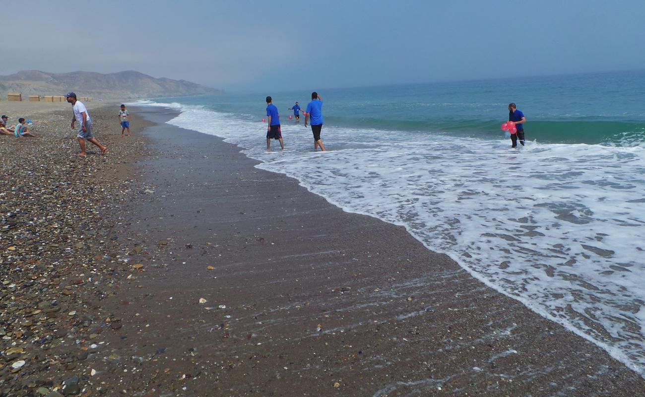 Plage Sidi Driss'in fotoğrafı gri kum ve çakıl yüzey ile