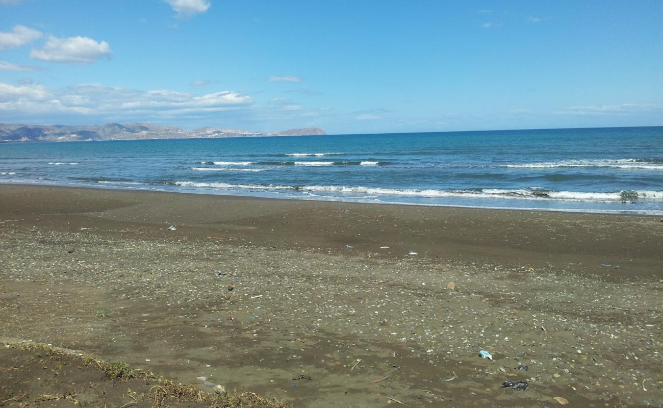 Plage Rush'in fotoğrafı kahverengi kum yüzey ile