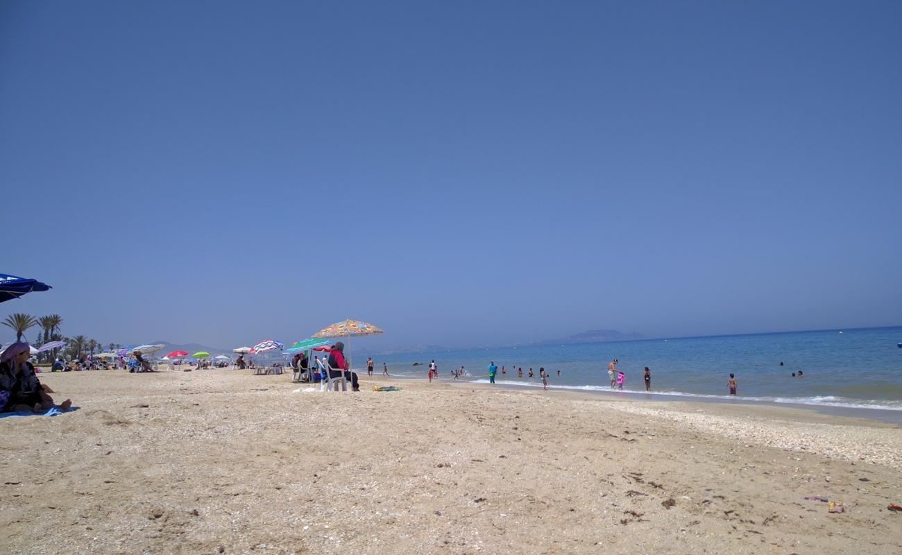 Soumia Plage'in fotoğrafı açık bej kum yüzey ile